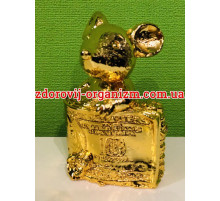 Золотий Мангуст із американською купюрою на залучення багатства