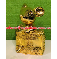 Золотий Мангуст із американською купюрою на залучення багатства