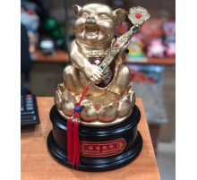 Свиняча золота на підставці символ достатку