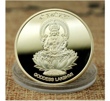Монета Лакшмі для приваблення грошей і достатку
