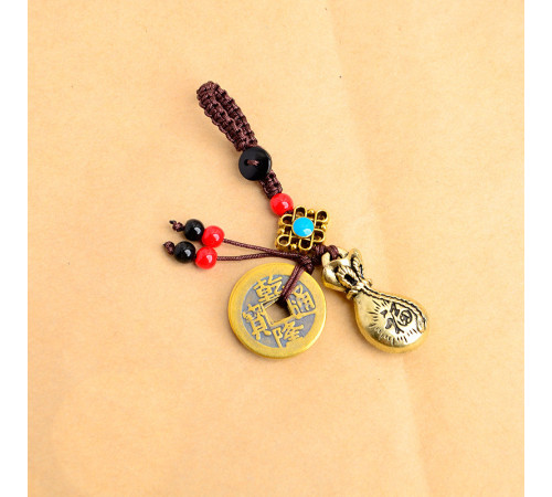 Брелок мішечок багатства з монетами та містичним вузлом