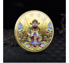 Золота монета Бог Багатства на злитці