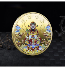 Золота монета Бог Багатства на злитці