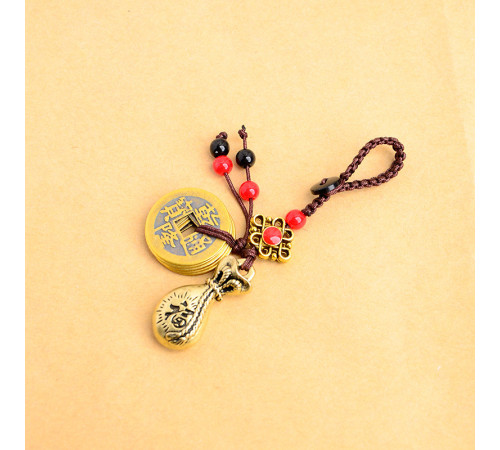 Брелок мішечок багатства з монетами для збереження грошей