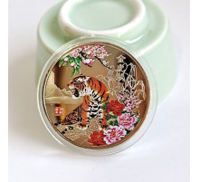 Монета Тигр уособлюють силу, гроші та удачу