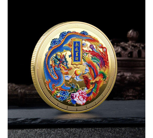 Монета Дракон і Фенікс із мантрою, що виконує бажання