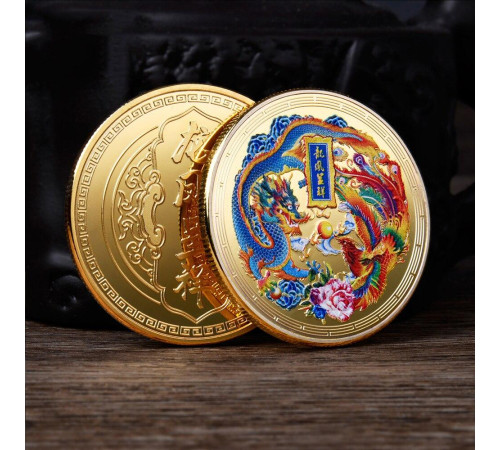 Монета Дракон і Фенікс із мантрою, що виконує бажання