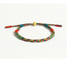 Тибетський браслет ручної роботи з тибетською символікою на удачу, щастя й захист