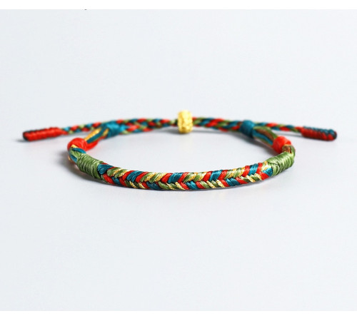 Тибетський браслет ручної роботи з тибетською символікою на удачу, щастя й захист