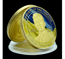Монета Президент України Володимир Зелений Три вістря трезуба також символізують перемогу золота
