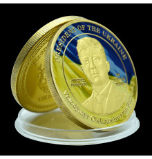 Монета Президент України Володимир Зелений Три вістря трезуба також символізують перемогу золота