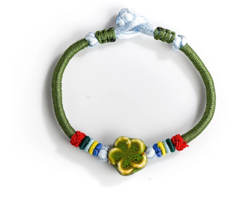 Сакральний Тибетський браслет ручної роботи із зеленим конюшином на багатство та здоров'я