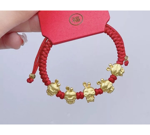 Тибетський браслет п'ять золотих кроликів на червоній нитці ручної роботи щастя, багатство, удача, любов