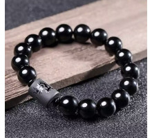 Бусина Дзі Дракон у браслеті з чорного обсидіана підсилює енергетику людини, удачу та здоров'я