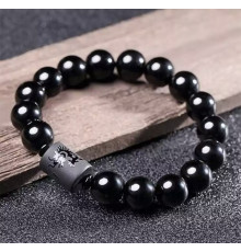 Бусина Дзі Дракон у браслеті з чорного обсидіана підсилює енергетику людини, удачу та здоров'я