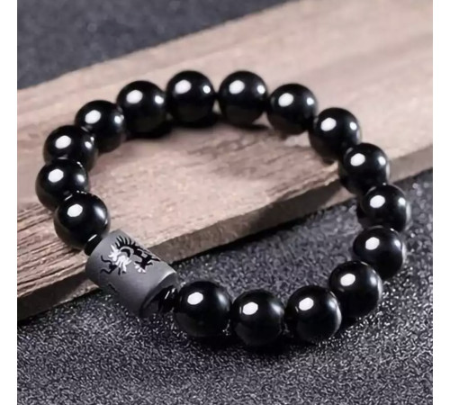 Бусина Дзі Дракон у браслеті з чорного обсидіана підсилює енергетику людини, удачу та здоров'я