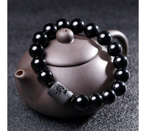 Бусина Дзі Дракон у браслеті з чорного обсидіана підсилює енергетику людини, удачу та здоров'я