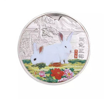 Срібна монета два білих кролики для кохання гармонії та великих грошей