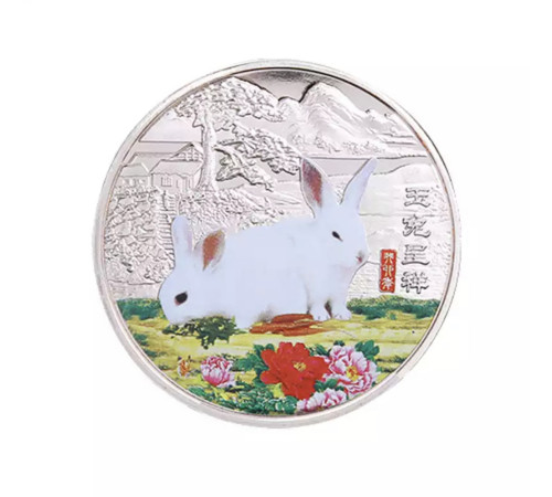 Срібна монета два білих кролики для кохання гармонії та великих грошей