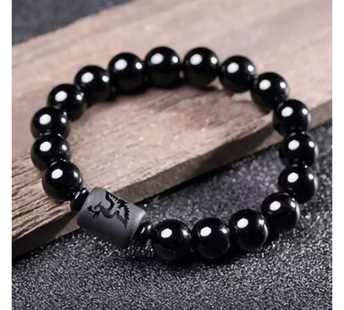 Бусина Дзі Фенікс у браслеті з чорного обсидіана підсилює енергетику людини, удачу та здоров'я активує