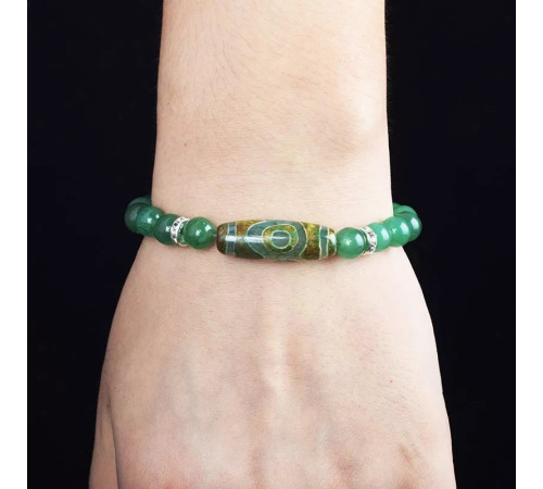 Бусина Дзі 3 очі в браслеті з зеленого тибетського нефриту три сили