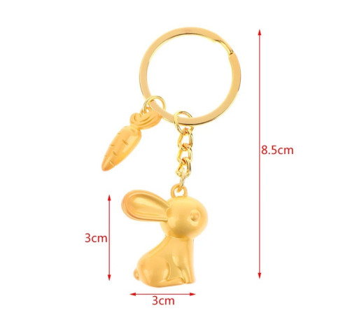 Брелок Кролик Золотий з морквою приносить любов, романтику та партнерство