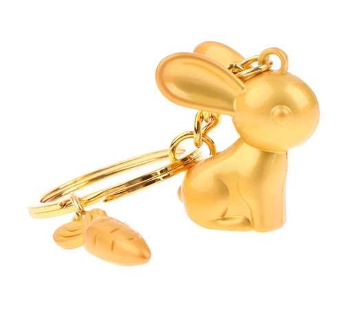 Брелок Кролик Золотий з морквою приносить любов, романтику та партнерство