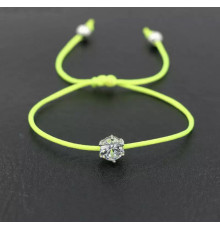 Браслет на зеленій нитці з фіанітом