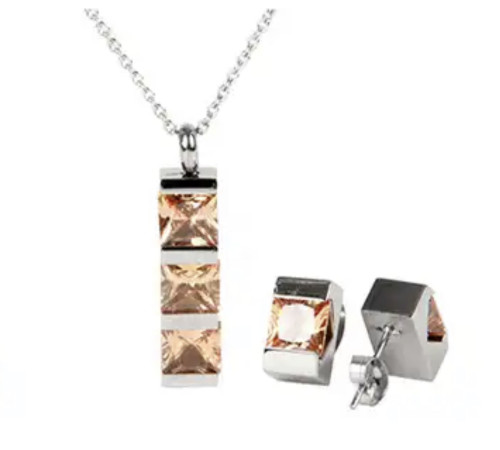 Титановий комплект кольє та сережки із золотими цитринами