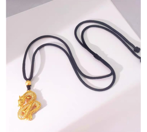 Золота підвіска Дракон на чорному шнурку приносить великий успіх, владу, у дім достаток, престиж і удачу